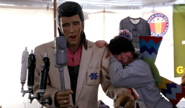 Elvis pouring beer